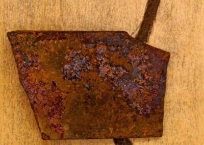 Title: rust 15, 18x18cm, metal/rust on wood, 2011